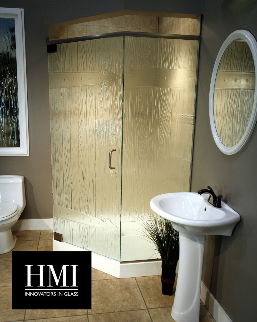 This one wasn't installed by us, but is a pattern that we offer, courtesy of the wonderful artisans at HMI Glass. (https://hmiglass.com/)